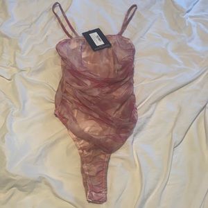 Tie dye pink body suit